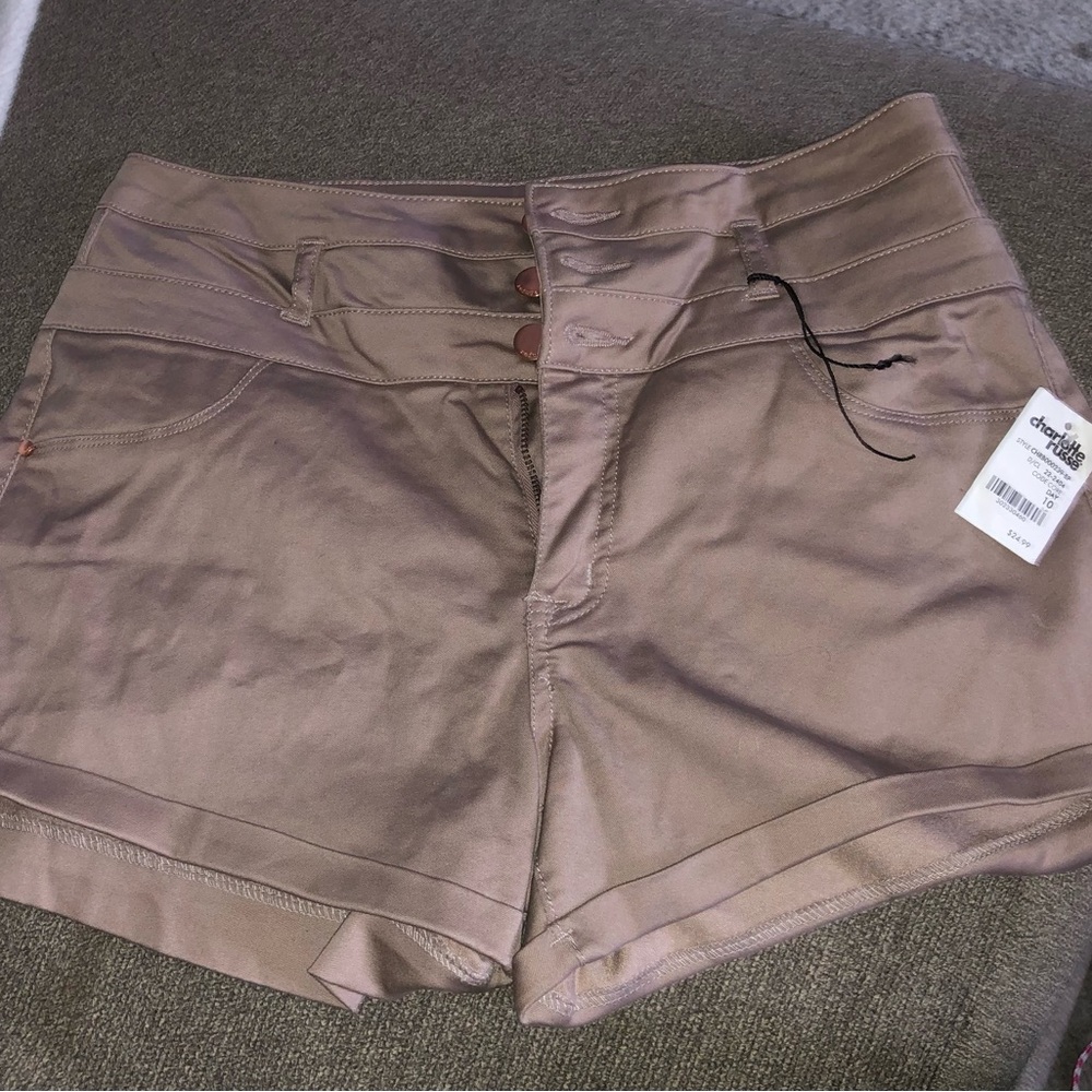 Never worn size 10 darker khaki colored stretchy shorts